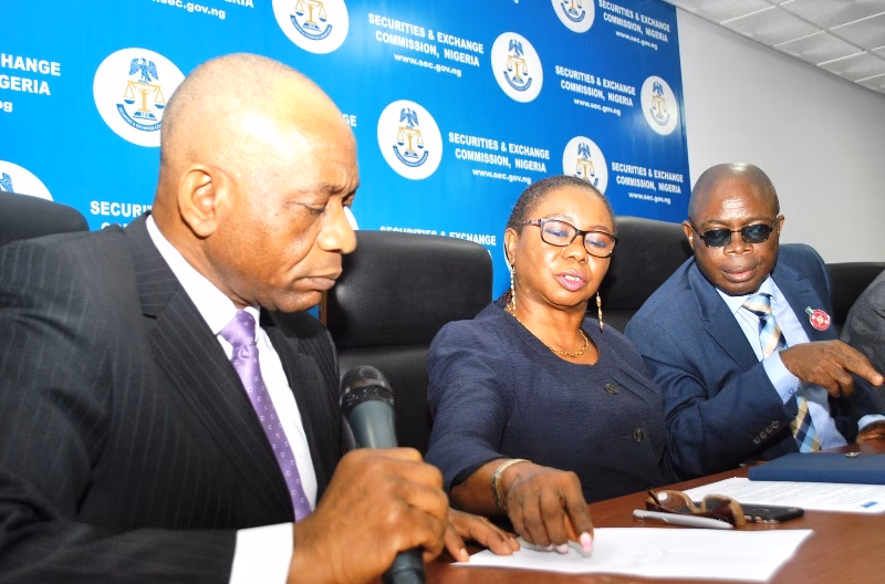 LEFT TO RIGHT: Director, External Relations, Securities and Exchange Commission Mr. Henry Rowlands, Coordinating Director Operations, SEC Ms Mary Uduk